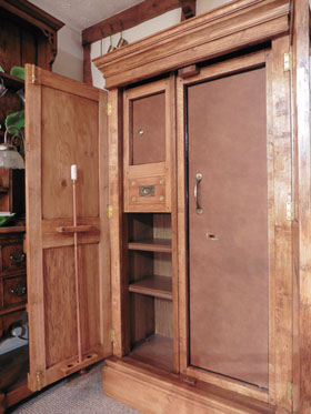 The Felbrigg Pair of Bespoke Gun Cabinets, 
